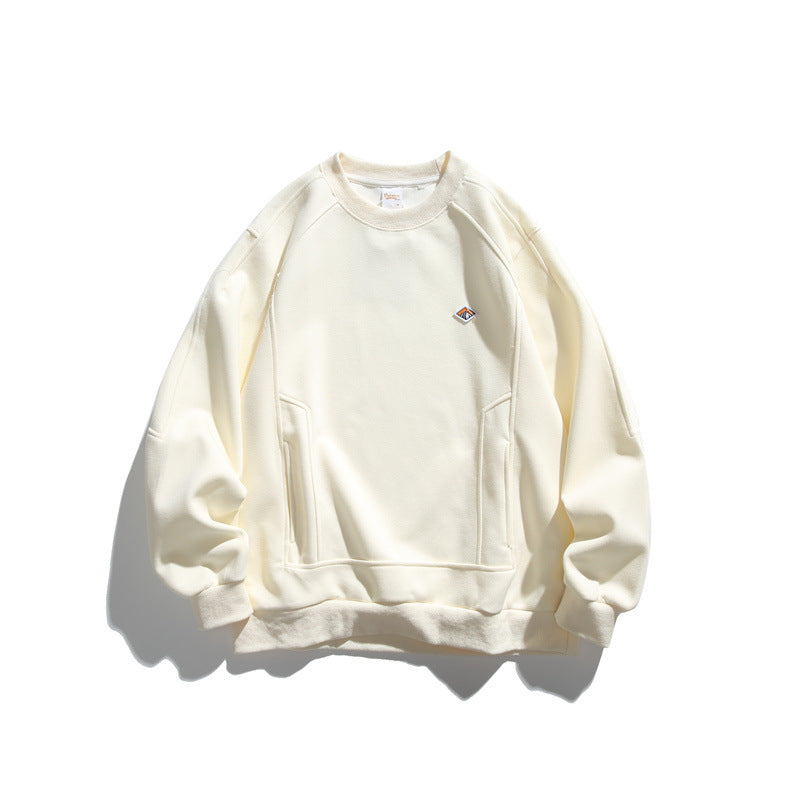 Unisex Oversize sweatshirt made of French terry with raglan sleeves, concealed side pockets, and a small logo patch Mune Fashion