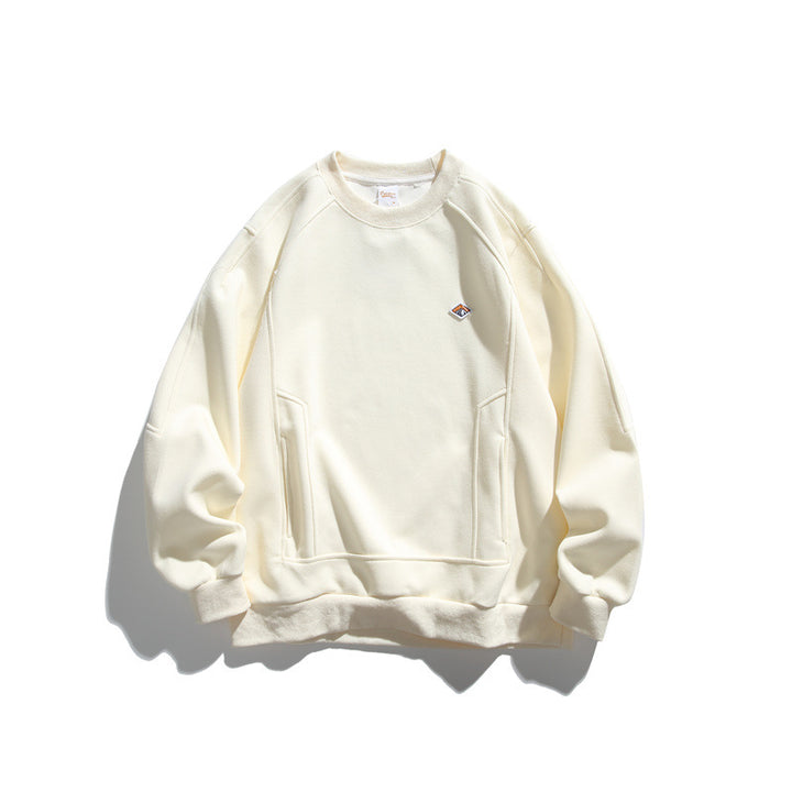 Unisex Oversize sweatshirt made of French terry with raglan sleeves, concealed side pockets, and a small logo patch Mune Fashion