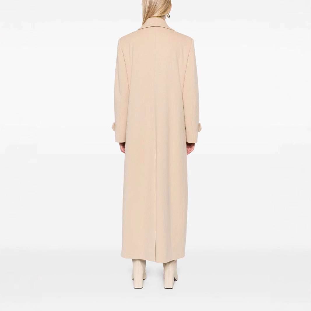 Ladies Maxi Coat with double-breasted button placket, wide lapels and patch pockets Mune Fashion