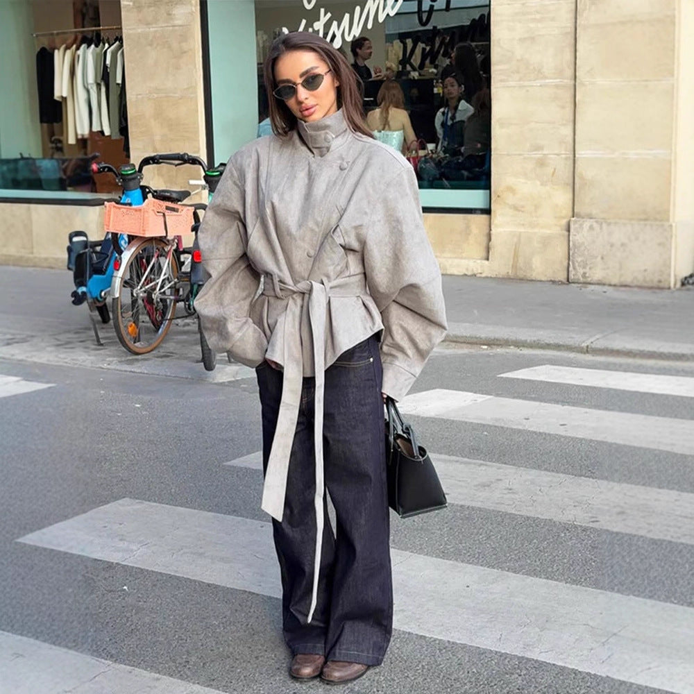Women's short jacket made of faux suede with a high stand-up collar, waist belt, and boxy oversized silhouette Mune Fashion
