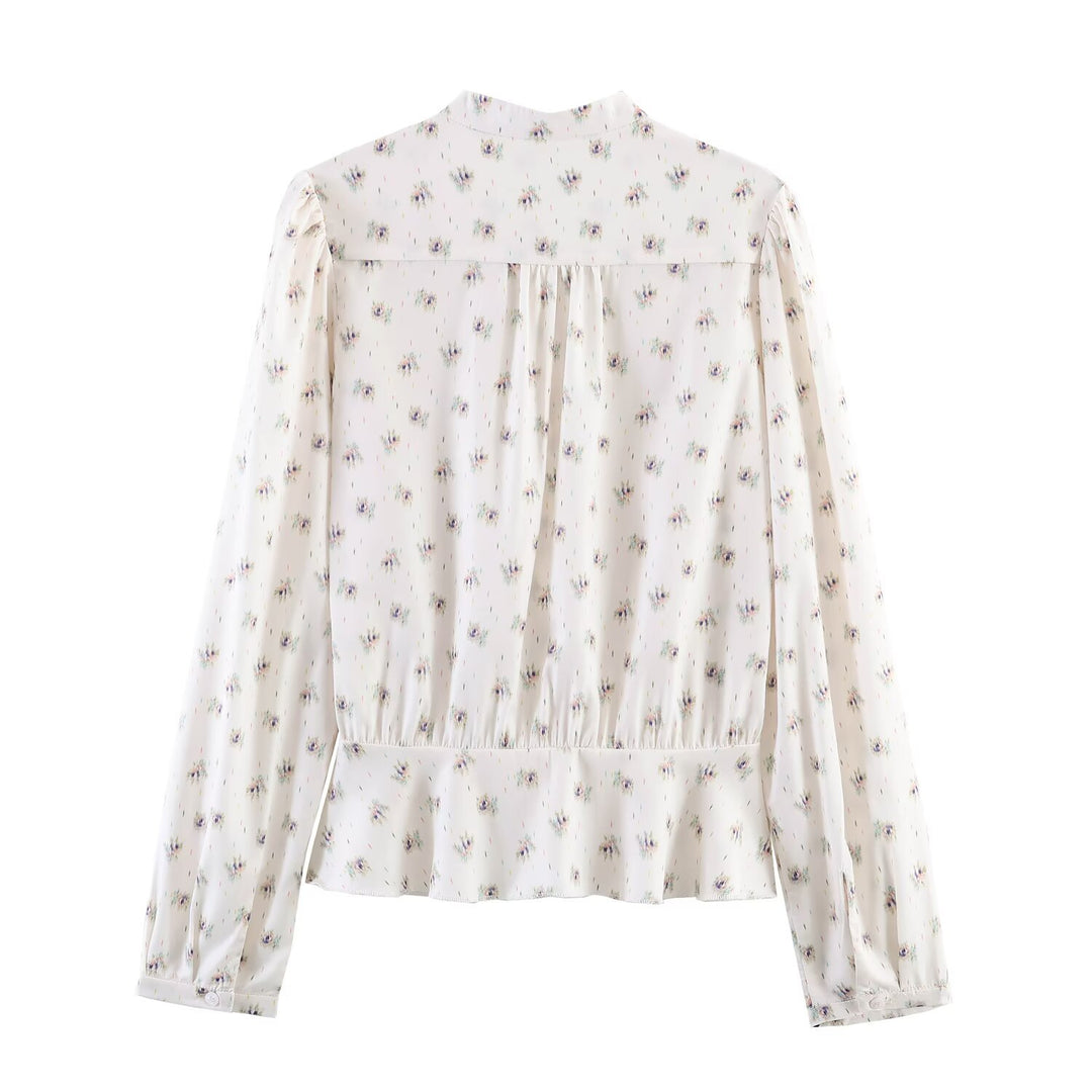 Women's chiffon blouse with bow collar, chest pintucks and peplum Mune Fashion