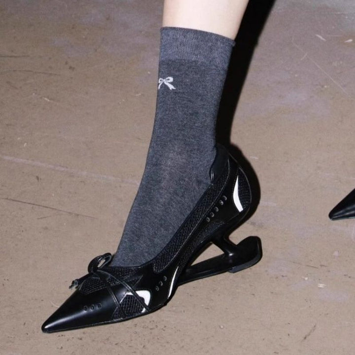 Women's pointed metallic slingback pumps with sculptural heel and bow accent Mune Fashion