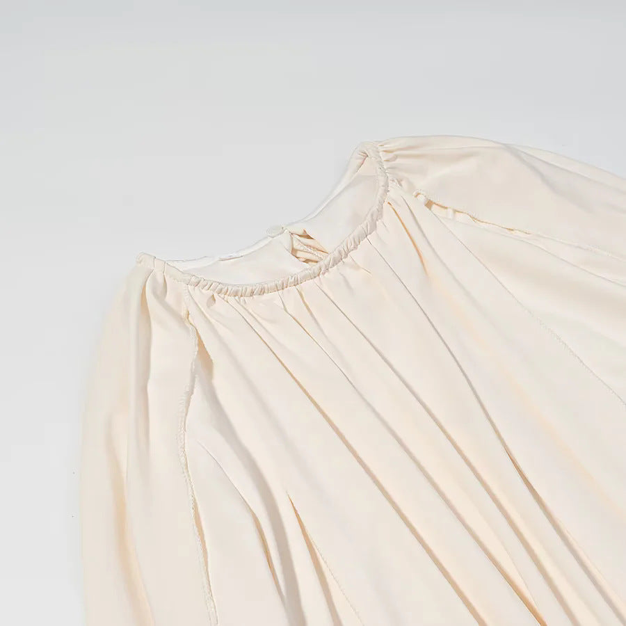 Women nan pleated cape top with wide fall, long sleeve slits, and elastic round neckline Mune Fashion