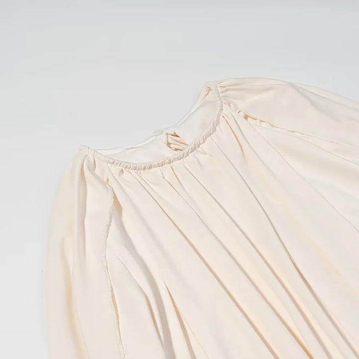 Women nan pleated cape top with wide fall, long sleeve slits, and elastic round neckline Mune Fashion
