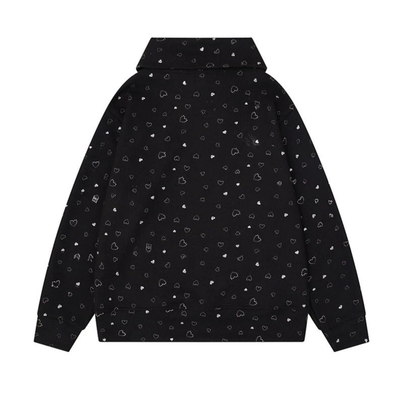 Women’s oversized sweatshirt with asymmetrical stand-up collar, kangaroo pocket and musical heart embroidery Mune Fashion