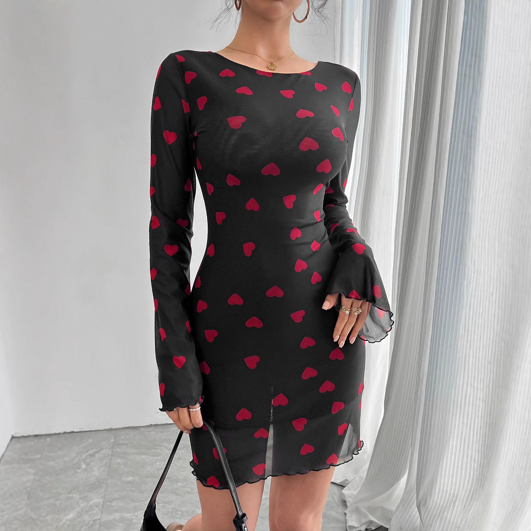 Women's figure-hugging mini dress made of fine mesh fabric with heart pattern and trumpet sleeves Mune Fashion