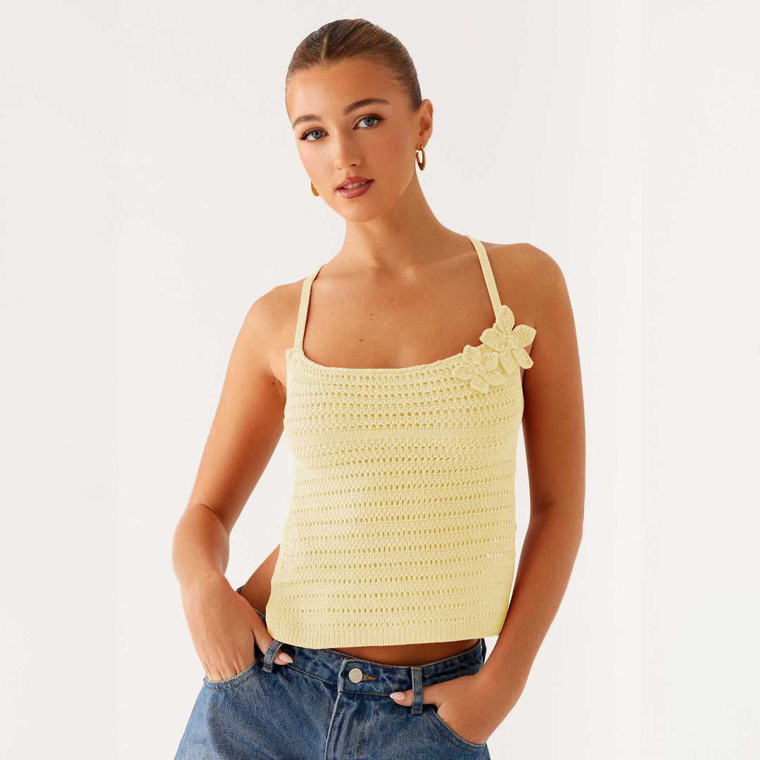 Women crochet top with floral accents Mune Fashion