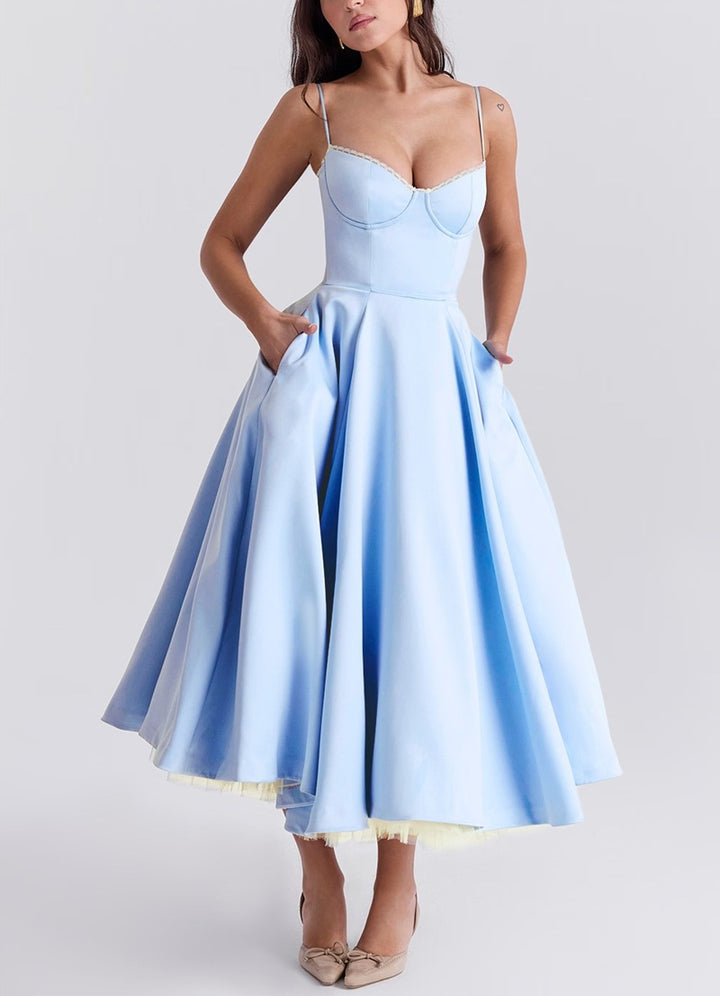 Women's tailored retro-inspired midi dress with corset underbust seams, flared skirt, and side pockets Mune Fashion