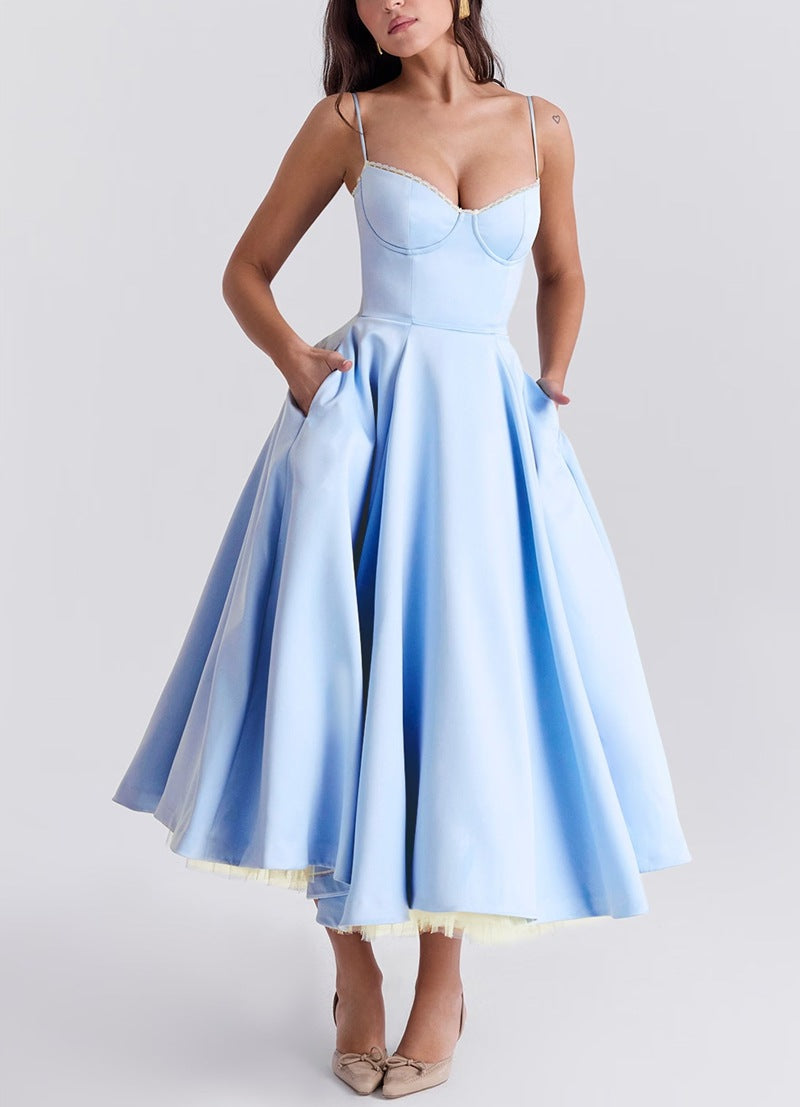 Ladies nan bustier dress with shaped bodice, soft flared skirt, integrated tulle underlay and side pockets Mune Fashion