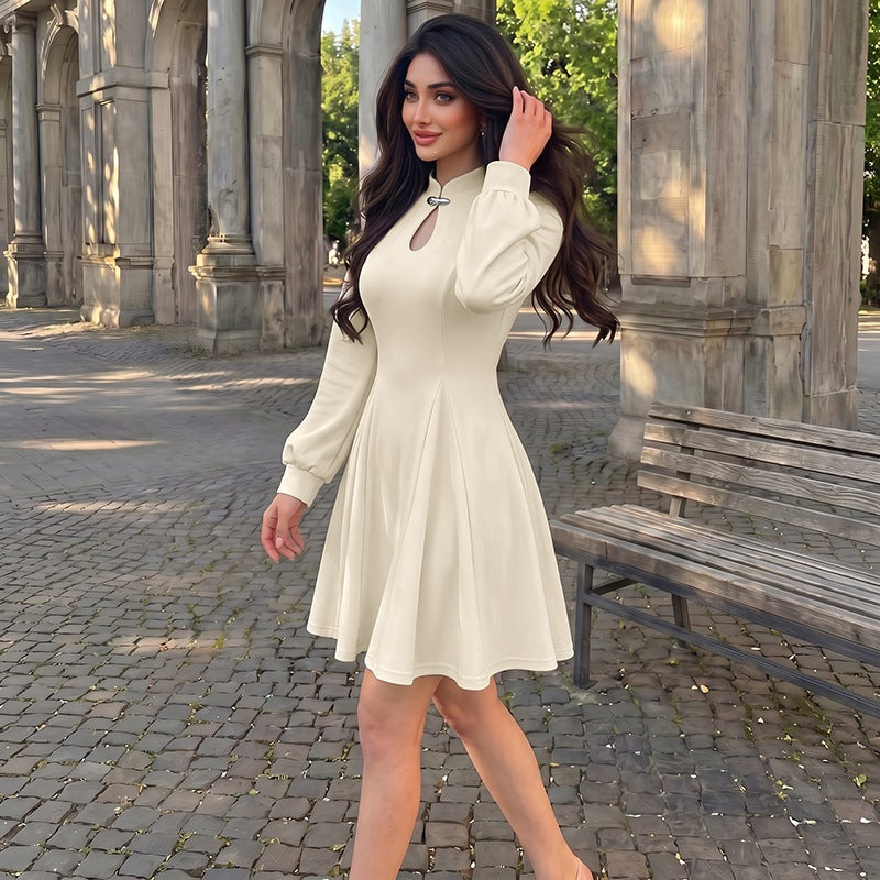 Women's elegant fitted skater dress with stand-up collar, keyhole detail & long balloon sleeves Mune Fashion