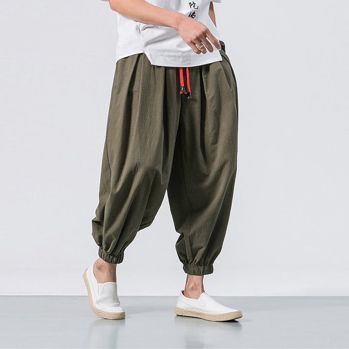 Men's unusual harem-style balloon pants with pleats, elastic waistband, and drawstring Mune Fashion