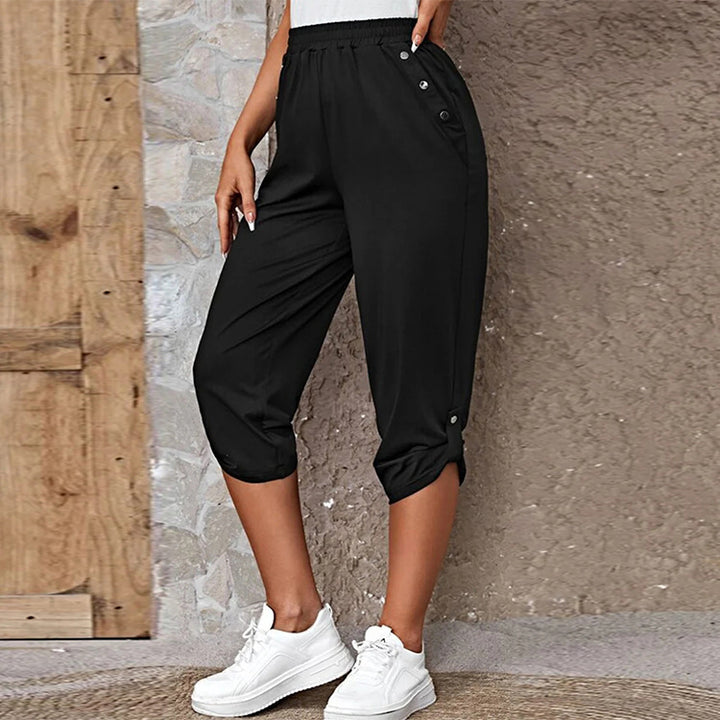 Women's casual three-quarter length pants with elastic waistband, side pockets and roll-up hem Mune Fashion