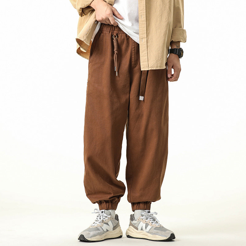 Men's wide relaxed cargo pants in jogger style with elastic tunnel drawstring waistband and cord decoration Drune