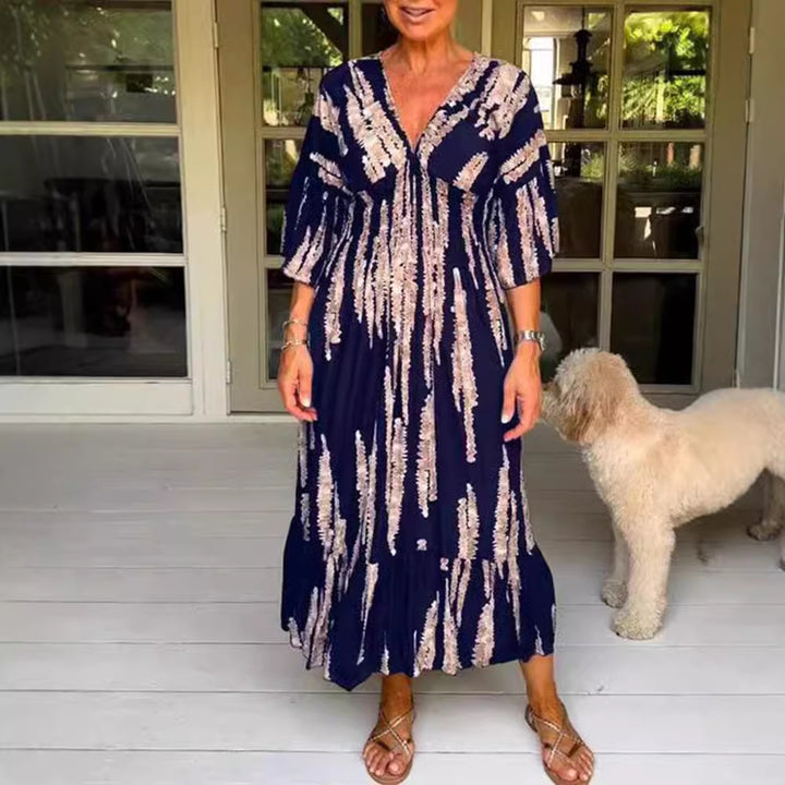Ladies' V-neck maxi dress with brushstroke pattern, gathered underbust, balloon sleeves, and ruffled tiers Mune Fashion