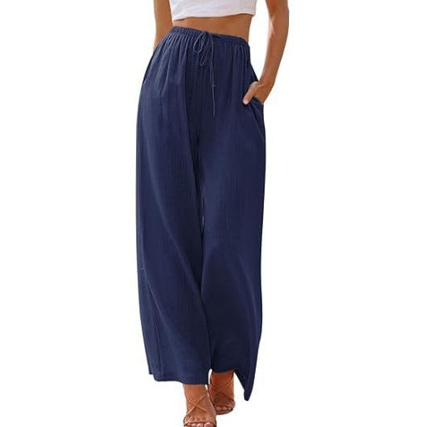 Women's wide linen pants with elastic waistband, drawstring, and side pockets Mune Fashion