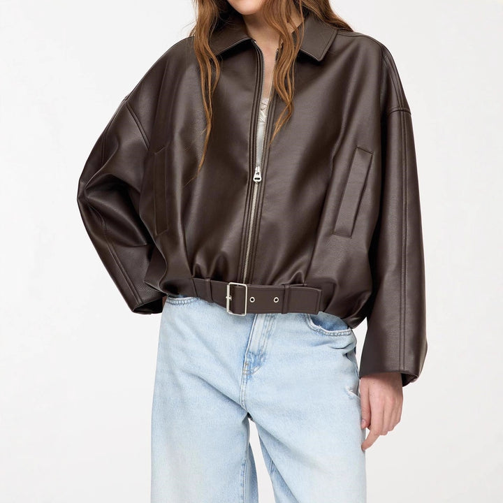 Women's stylish faux leather jacket with eye-catching collar and waist belt