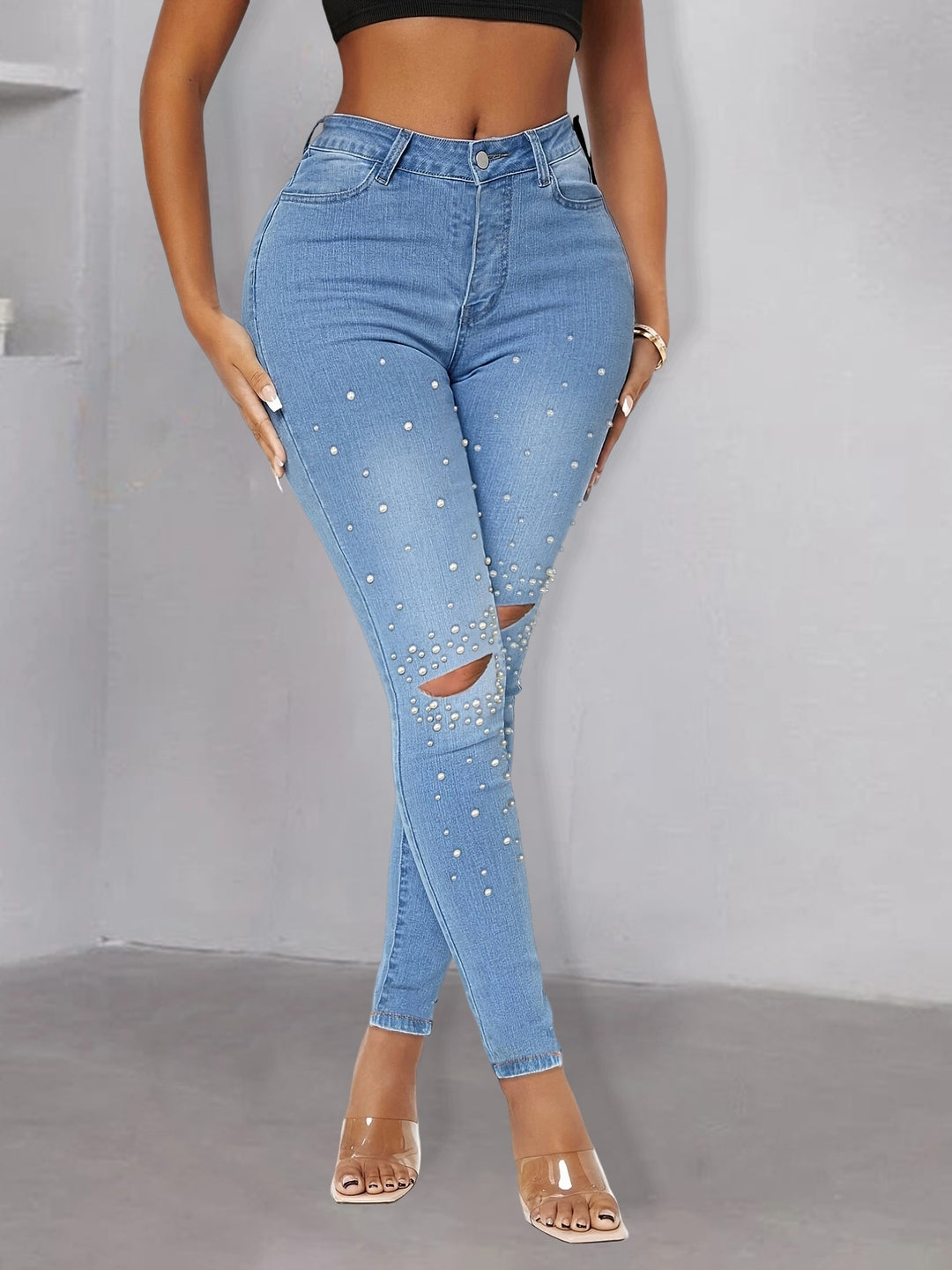 Women pearl-embellished high-waist skinny jeans with knee cutouts Mune Fashion