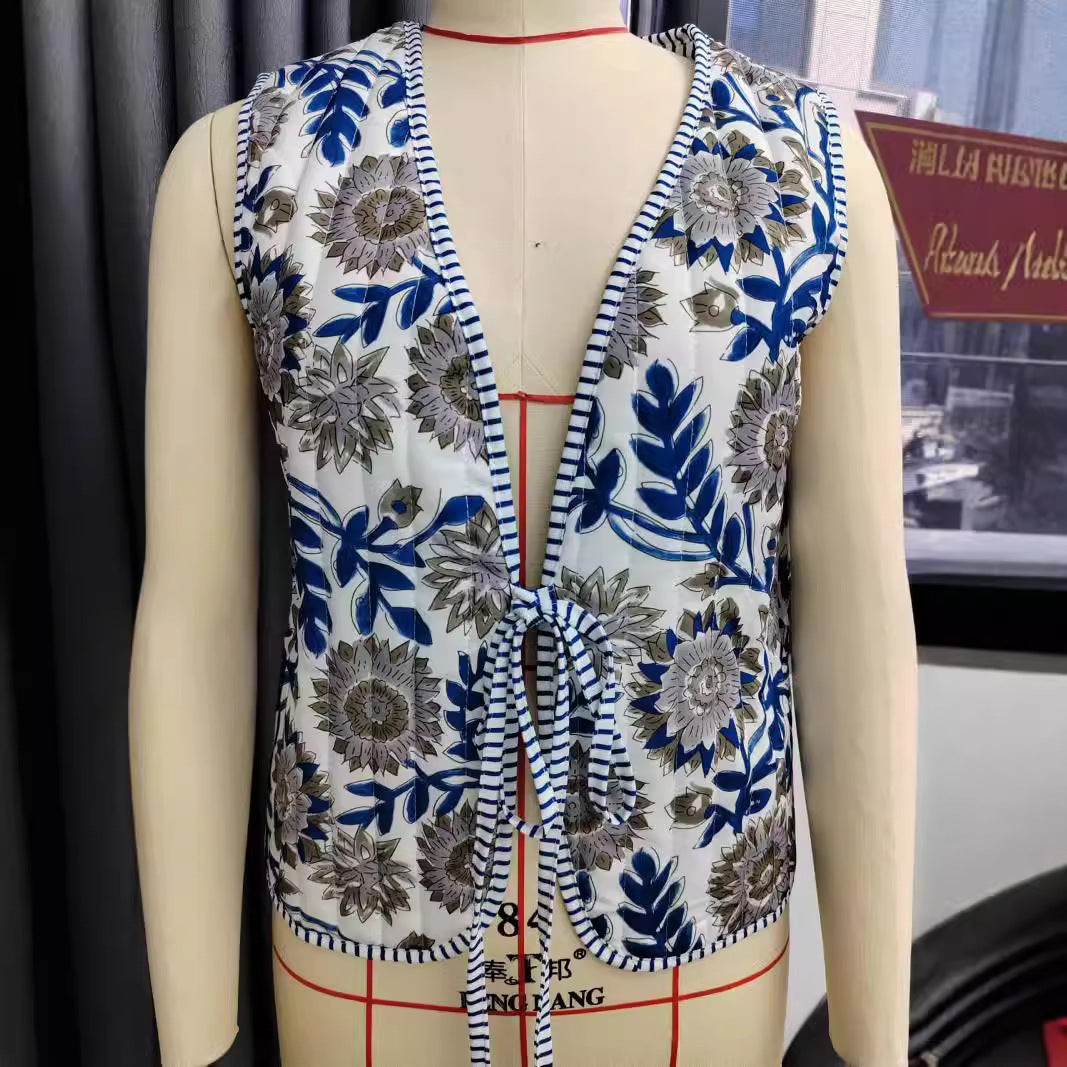 Ladies patchwork vest with tie belt, striped interior finish and contrast piping Mune Fashion