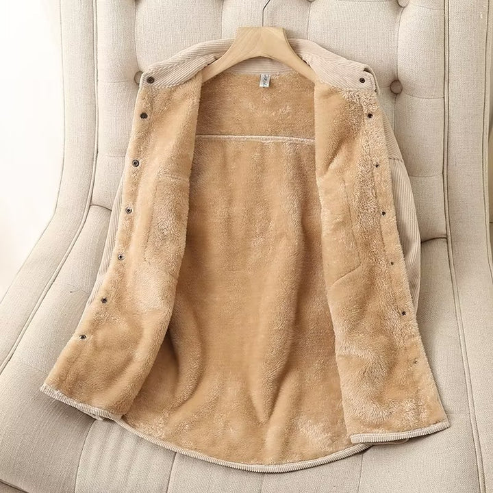 Women's oversized cord shirt jacket with padded teddy lining, patch pockets, and snap-button placket Mune Fashion