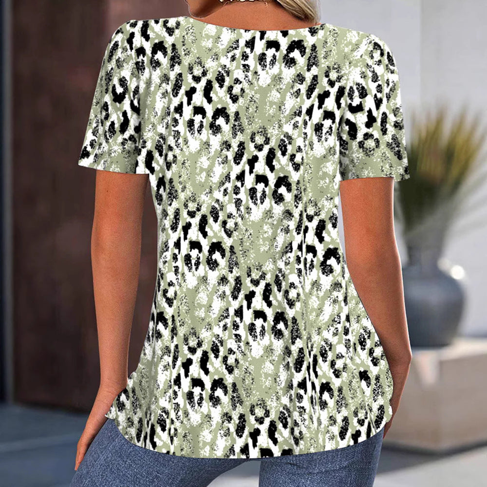 Women loose-fitting short-sleeve blouse shirt with round neckline, bust pleats, and abstract leopard pattern Mune Fashion