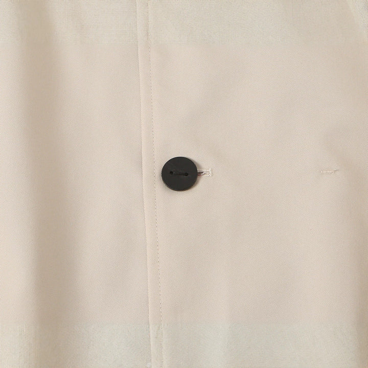 Women's short jacket with high stand-up collar and asymmetrical button placket Mune Fashion