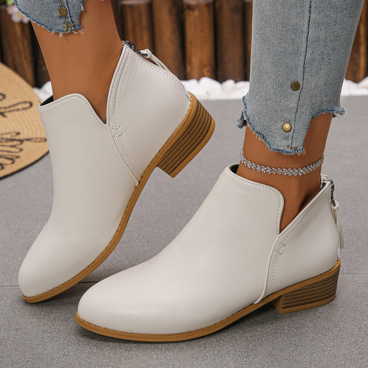 Women's ankle boots with rear zipper, sleek toe and low block heel Mune Fashion