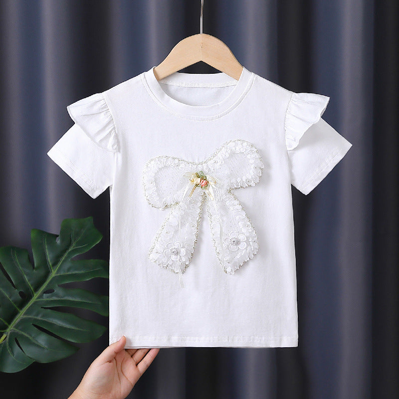Girls T-shirt with decorative ruffle design and artistic bow motif Mune Fashion