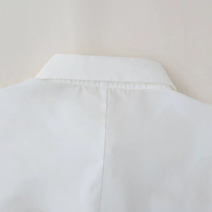 Women's loose-fitting shirt blouse with palm sequins, shirt collar and pearl detail Mune Fashion