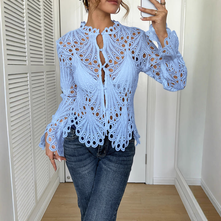 Women's filigree crochet lace blouse with stand-up collar, decorative button placket, and wavy hem Mune Fashion