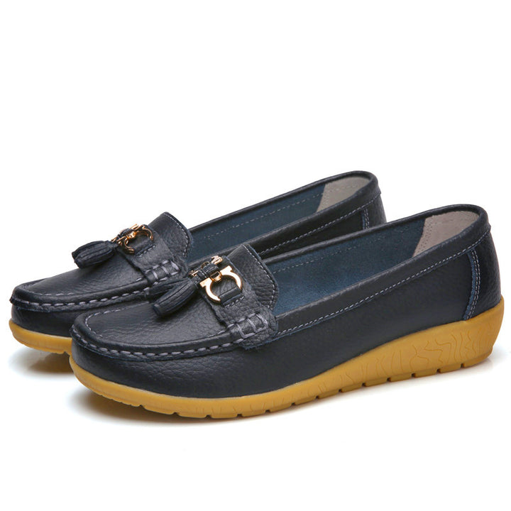 Women's classic tassel moccasin made of textured synthetic leather with padded comfort insole and flexible wedge sole Mune Fashion