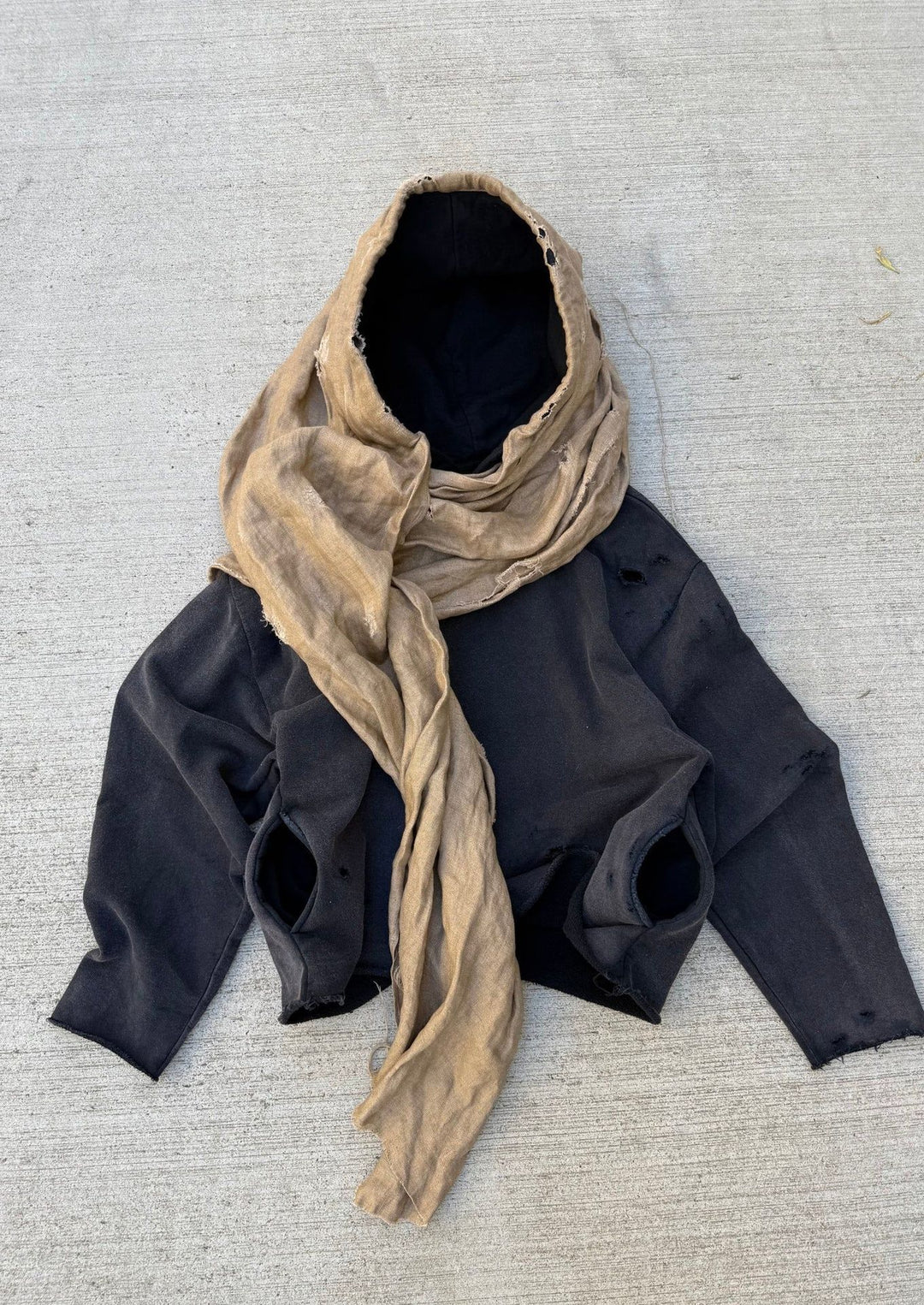 Unisex hooded pullover in usage marks style with attached tube scarf and frayed openings Mune Fashion
