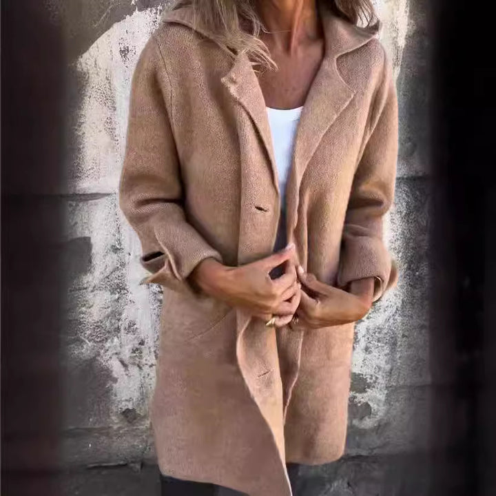 Women nan Oversize wool blend coat with lapel collar, patch pockets, buttoned front, and rolled-up sleeves Mune Fashion