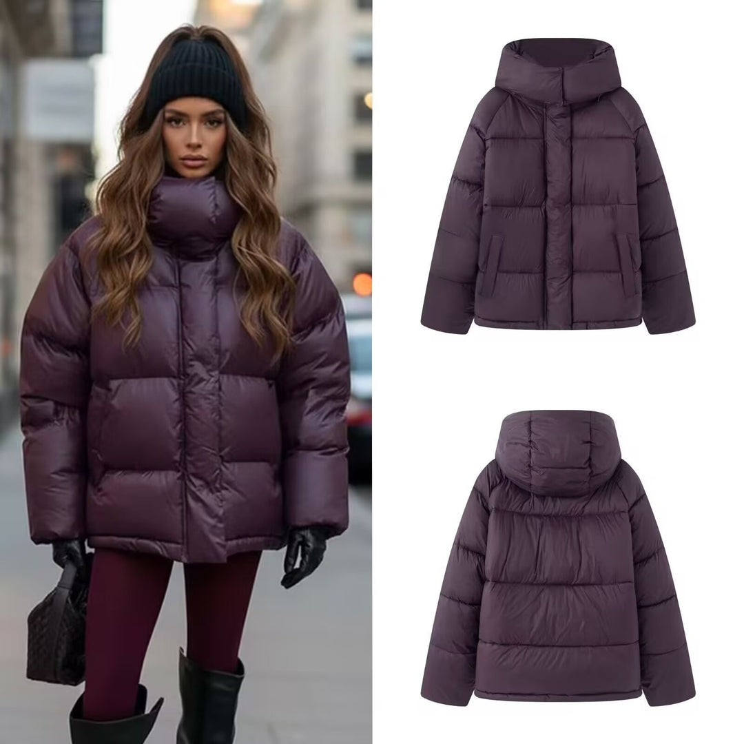 Ladies short padded oversized quilted jacket with high standing collar and hood Mune Fashion