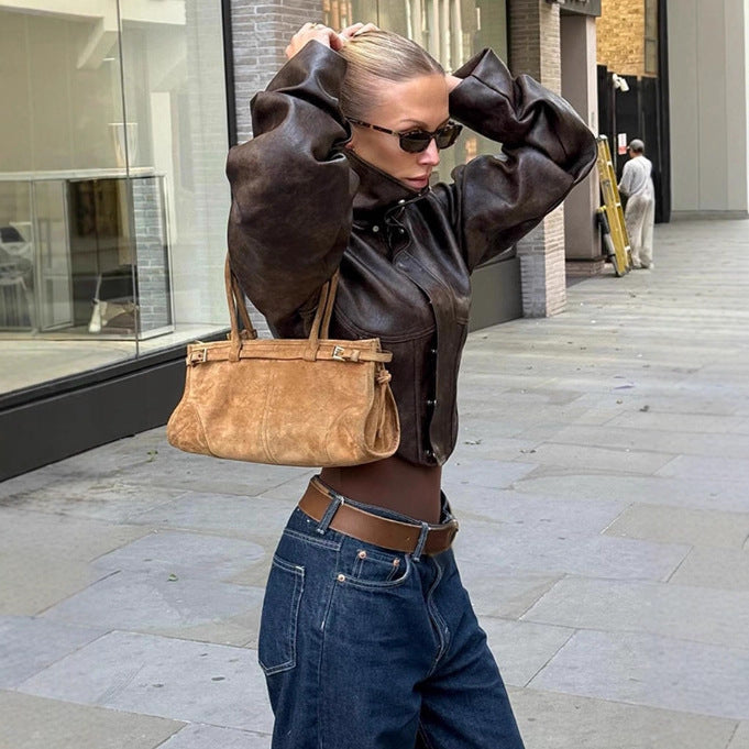 Women's short jacket made of faux leather with a high stand-up collar, shoulder flaps, and tailored silhouette Mune Fashion