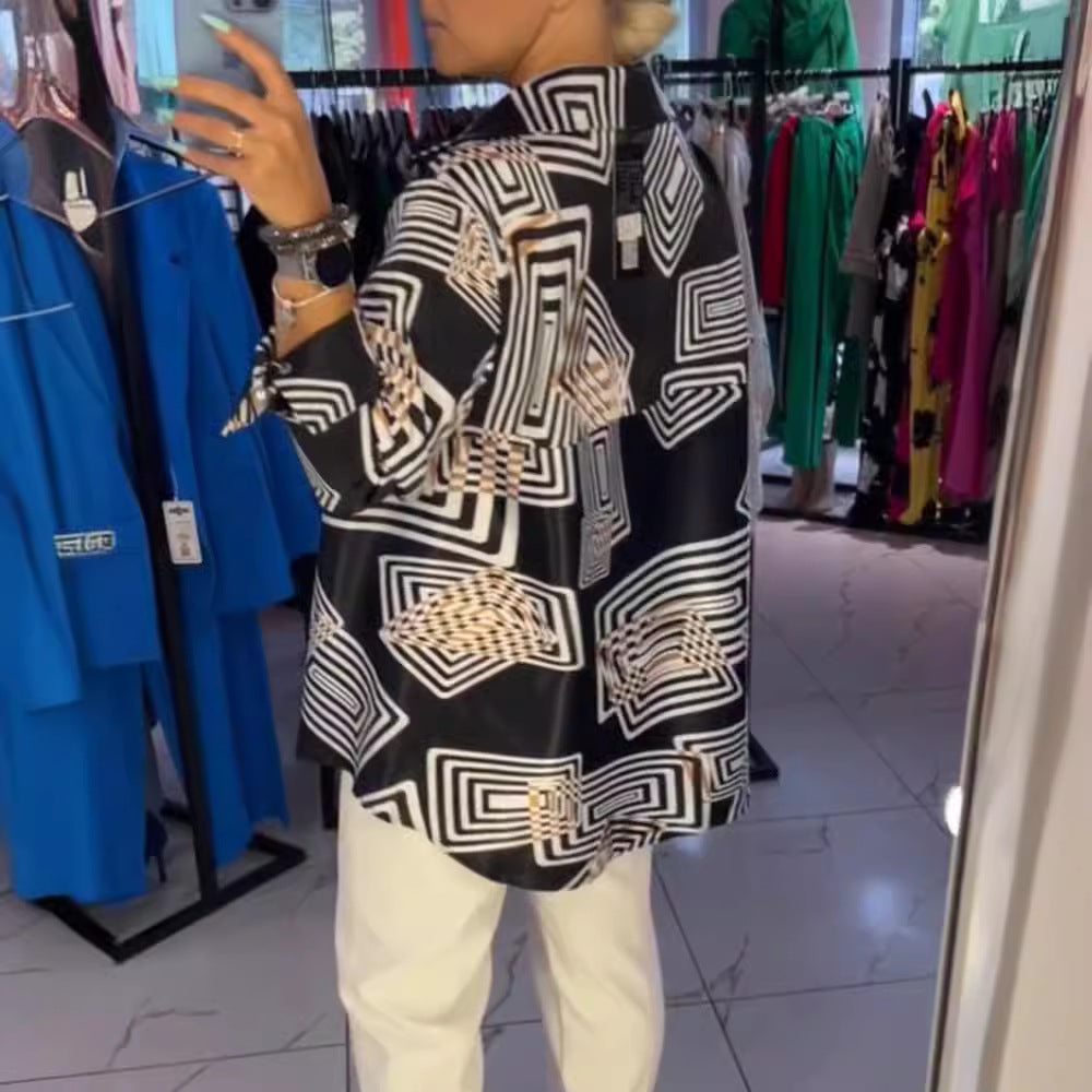 Women’s loose silk-look blouse with graphic square print, asymmetrical hem and mother-of-pearl button placket Mune Fashion