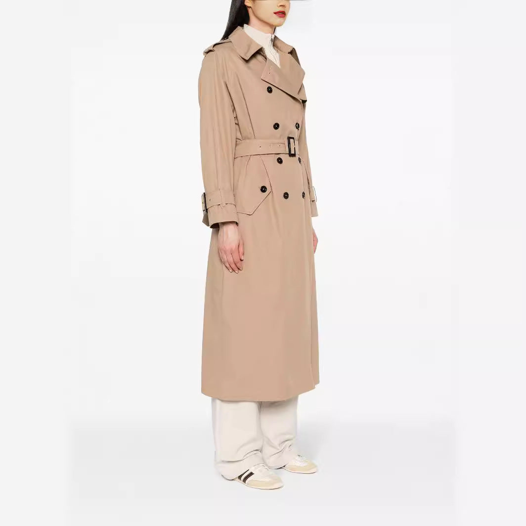 Women's trench coat in maxi length with double-breasted button placket and waist belt Mune Fashion