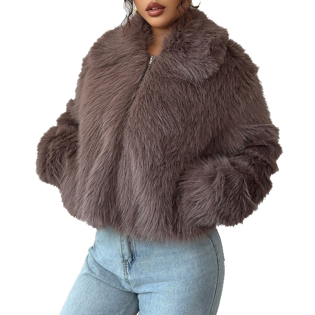 Women's short faux fur jacket with standing collar, concealed zipper and wide sleeves Mune Fashion