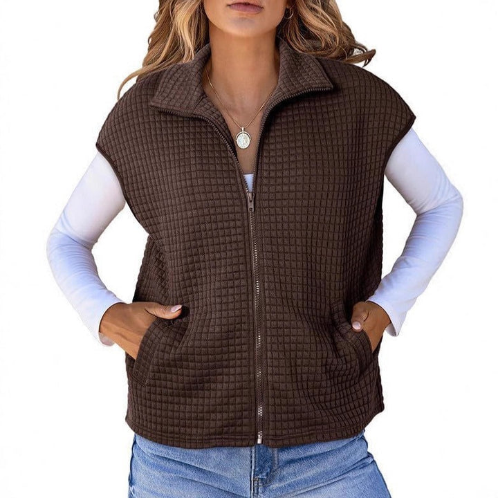 Women's padded vest with zipper, stand-up collar and side pockets Mune Fashion