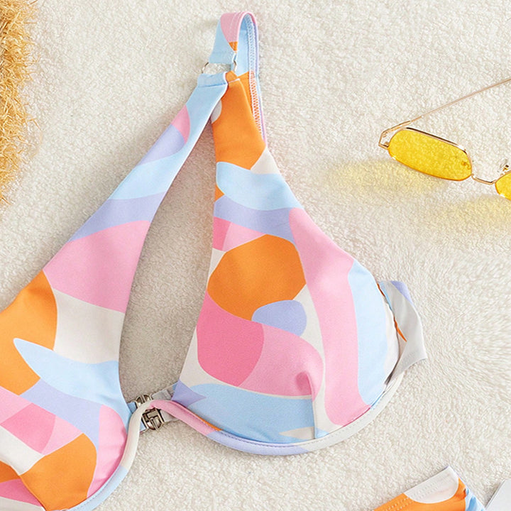 Ladies triangle bikini with asymmetrical design and high waistband Mune Fashion