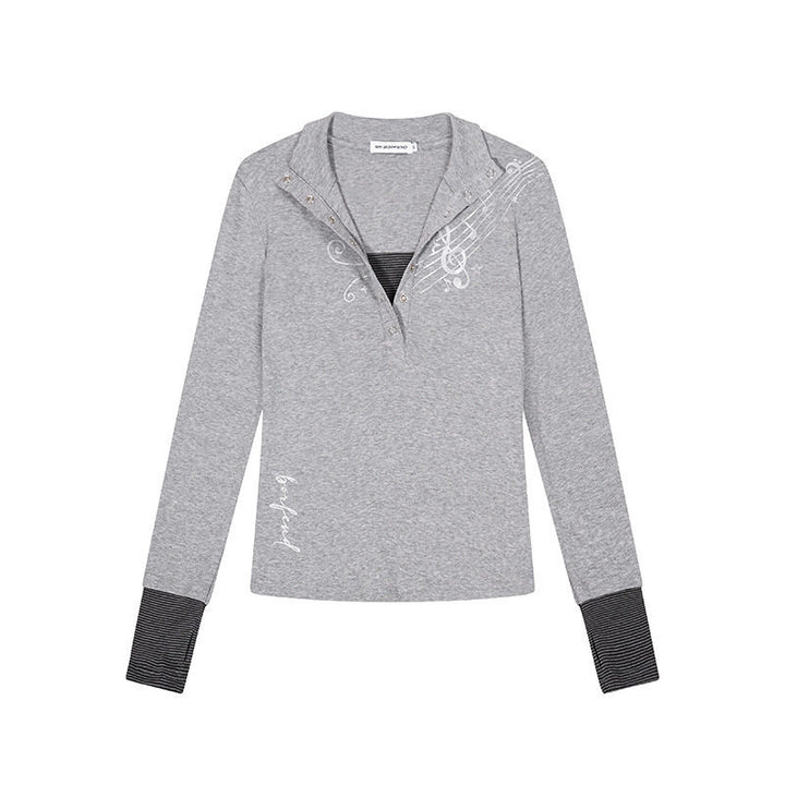 Women’s long-sleeve shirt with Henley button placket, contrast cuffs, and music note print Mune Fashion