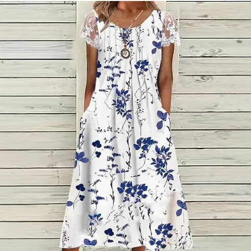 Ladies' airy A-line midi dress with lace sleeves, side pockets, and round neckline Mune Fashion