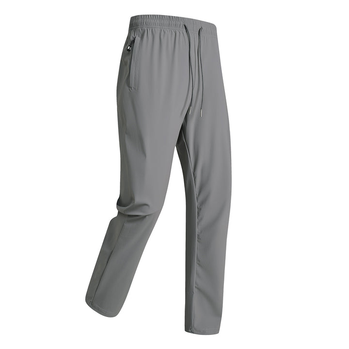 Men's sporty training pants with elastic waistband and zippered pockets Mune Fashion