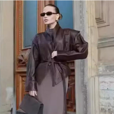 Women's longer tailored faux leather coat with shawl collar and tie belt Mune Fashion