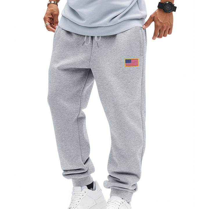 Men's trendy joggers with elastic drawstring waistband, ribbed cuffs, and discreet flag application Mune Fashion