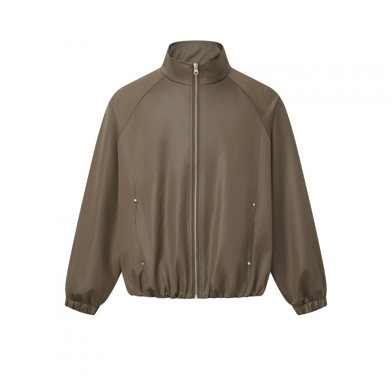 Men's short cut faux leather bomber jacket with stand-up collar, raglan sleeves, and elastic hem Mune Fashion