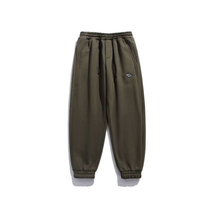 Unisex locker cut fleece jogging pants with drawstring, elastic hem and side pockets Mune Fashion