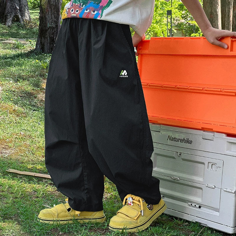 Women's wide functional trousers with elastic waistband and side pockets Mune Fashion