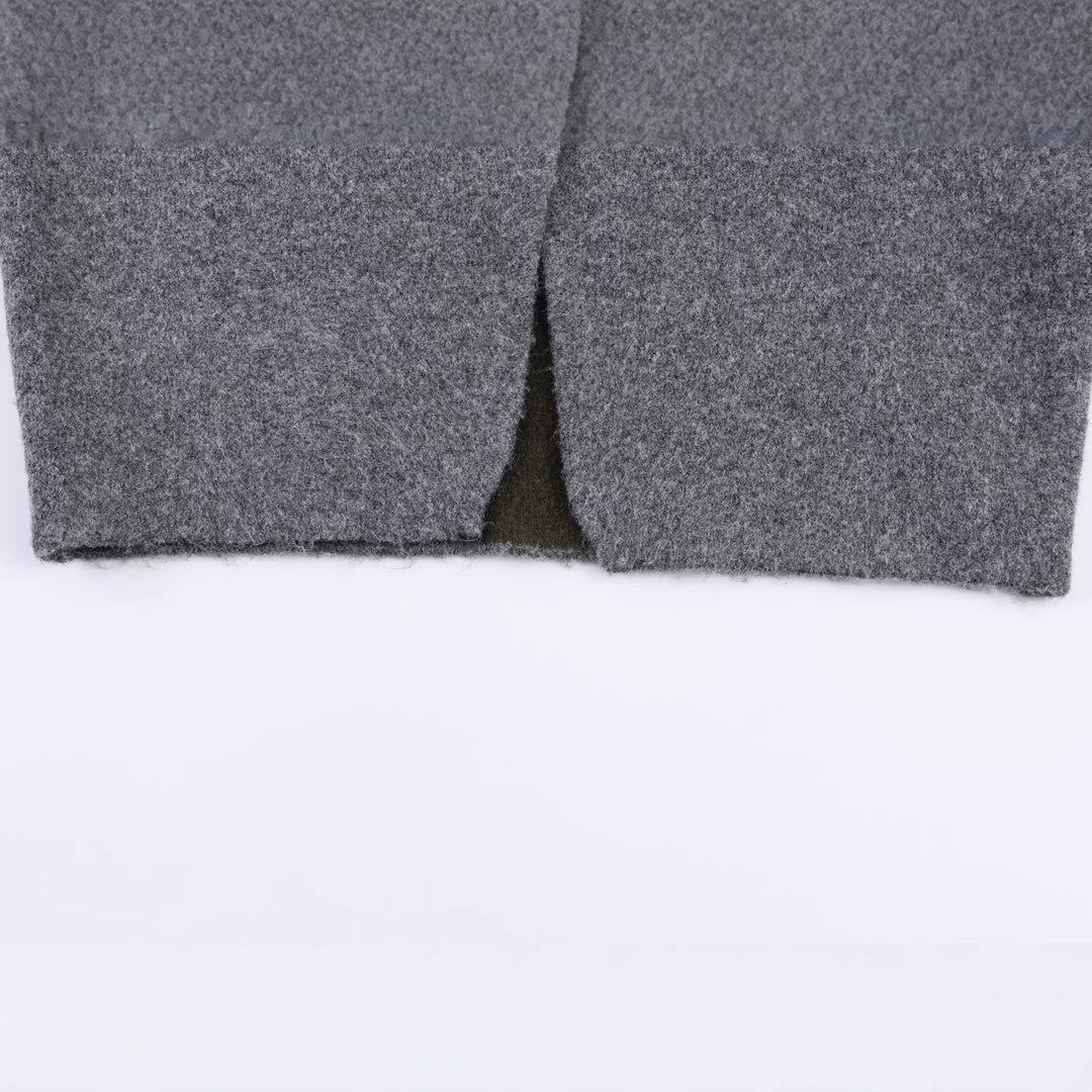 Women's short cut boxy jacket made of boucle wool blend with open V-neck Mune Fashion