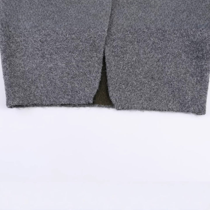Women's short cut boxy jacket made of boucle wool blend with open V-neck Mune Fashion