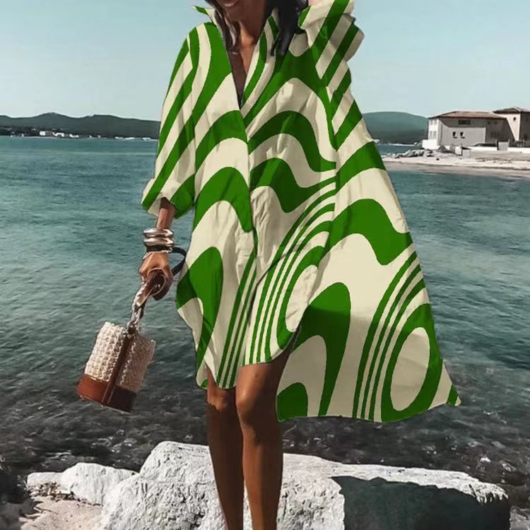 Women's airy beach dress kaftan with tropical leaf print and wide cut Mune Fashion